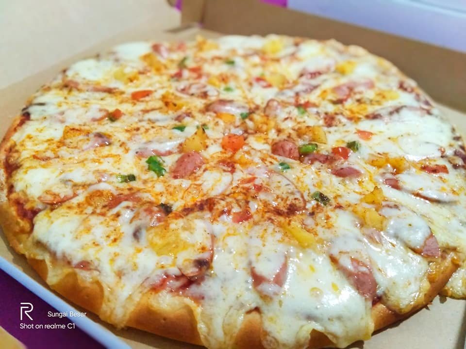 khamis pizza